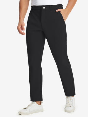 Front lower body shot of model wearing water-resistant stretch heat-tech winter trousers in black