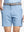 Front waist to knee view of light blue water resistant golf 7 inch shorts, clean athletic fit.