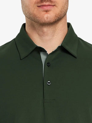 Model wearing the olive green long sleeve pique polo, highlighting its elegant and practical design.
