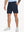 Front lower-body view of model wearing NAVY Water Resistant Versatile 8 Pockets Shorts.