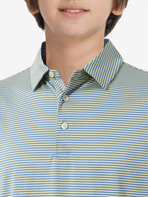 Front view of youth wearing yellow stripe performance cooling polo, showing collar and chest fit