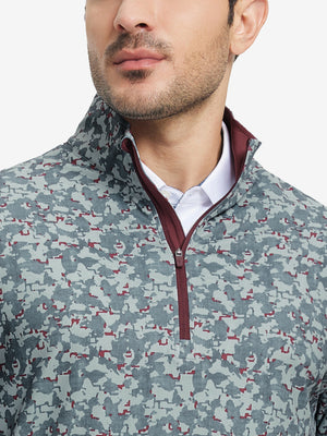 Close-up from nose to chest, showing zipper collar detail and fabric pattern of the grey/wine camo pullover.