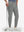 Front lower body shot of model wearing iron grey flat front golf joggers pants with belt loops