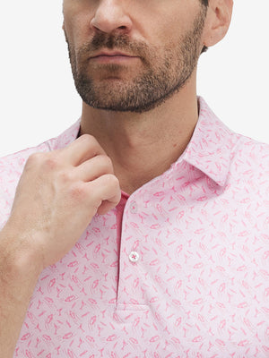 Front view from nose to chest of model wearing the pink wine glass 4 way stretch print collared polo shirt, showcasing the upper fit