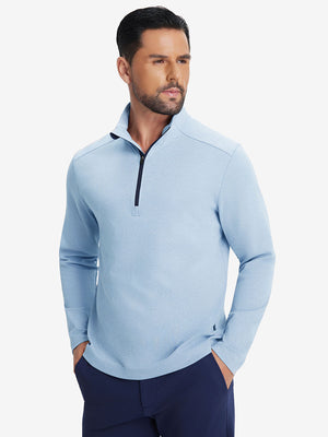 Front upper body shot of model in light blue two tone pique cotton blend q-zip