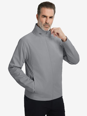 Model wearing the lightweight water-repellent softshell hooded jacket, neutral grey, front upper-body outdoor style.