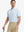 Model wearing Slate Blue Aqua Blue Stripe Performance Stripe Golf Shirt – front half-body pose