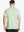 Back half-body view of male model wearing the Canary Green Everyday Classic Solid Polo