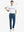 Full front view of model in Water Repellent 8 Pockets Pants BLUE INDIGO，ready for golf with club in hand.