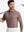 Half-body front view of model holding golf club wearing WINE RED STRIPE Performance Yarn Dye Striped Polo