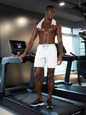 Full-body gym view of model in WHITE 2 in 1 Running Sports Shorts with Liner