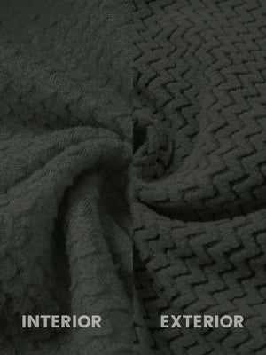 Close-up of the inner and outer fabric of full zip fleece hoodied jacket in forest green, showing exture and finish
