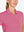 Close-up front view from nose to chest in PINK LEMONADE Women's Performance Solid Polo