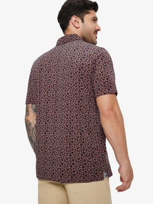 Back half-body view of model in WINE RED FLOWER Popular Heather Print Polo
