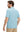 Back half-body view of a model wearing the aqua feather weight jacquard polo shirts, highlighting the rear fit