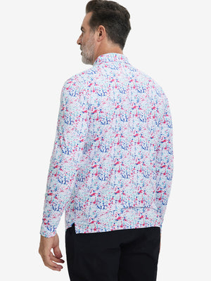 Back upper body view of the lightweight print polo in white painting, model turns slightly with relaxed pose.