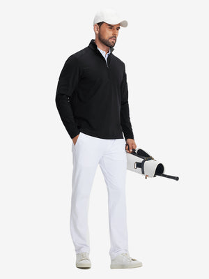 Model carrying golf bag in Fleece lined golf quarter zip with versatile black look