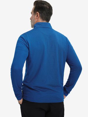 Back upper view of model wearing jacquard quarter zip pullover in cobalt, showing clean seam lines.