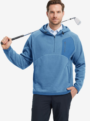 Model holding a golf club, dressed in Misty Blue Quarter Zip Polar Fleece Sweatshirt, sporty fit.