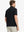 Rear view of Everyday Solid Jersey Polo in BLACK worn by model, showing clean lines and fit.