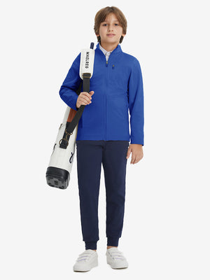 Full-body view of model wearing kids soft lightweight fleece lined jacket in klein blue, displaying the jacket's fit and design.