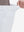 Detail view of elastic waistband on white breathable casual slacks with 4 pockets