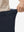 Detail view of elastic waistband on navy women's regular fit stretchy golf pants
