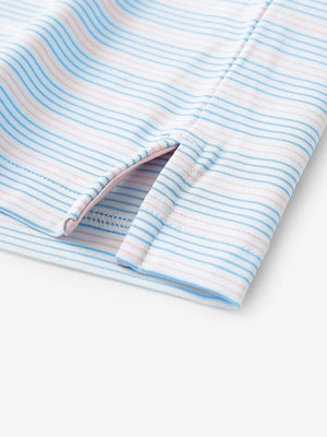 Close-up of side hem slit on Blue Pink Stripe Performance Stripe Golf Shirt