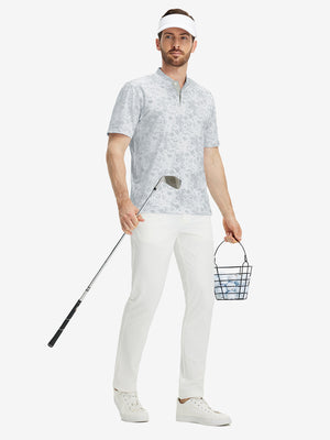 Full front: model in grey splatter stretch printed collarless henley golf shirts holding golf club.
