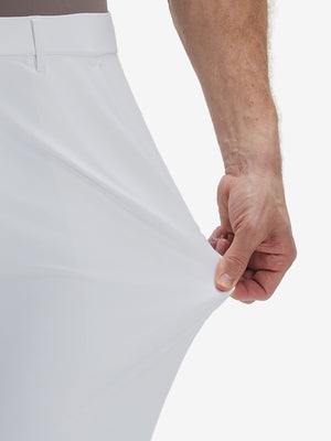 Detail view of pants elasticity on white breathable casual slacks with 4 pockets