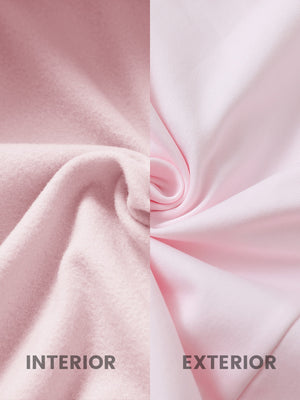 Close-up fabric detail of women's lightweight slim-fit puffer vest, smooth texture and light pink finish