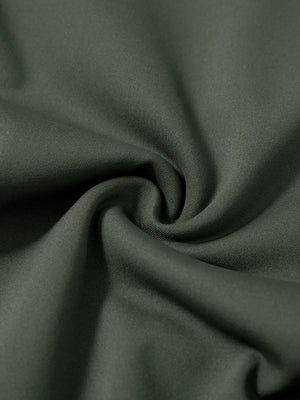 Fabric close-up of olive green lightweight ankle-zip sweatpants with 4 pockets, breathable performance material.