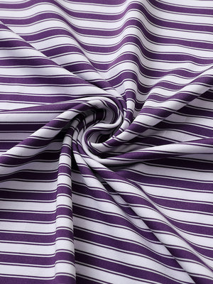 Close-up of purple white yarn dyed stripe polo fabric showing distinct woven stripes and textured surface.