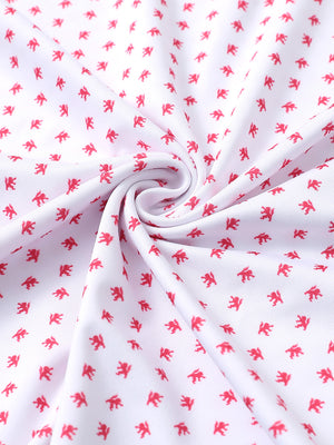 Fabric close-up of Everyday performance print polo with lightweight texture in white red lion