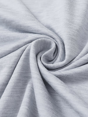 Fabric close-up of Quarter zip melange pullover with blended texture in faded denim heather