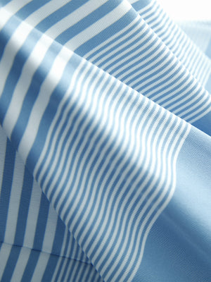 Fabric close-up of Performance yarn dye striped polo showing crisp stripes and blue white stripe detail