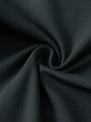 Close-up of ultra-stretch quick dry fabric used in dark grey women's golf sweatpants