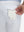 Detail view of back pocket on white flat front golf joggers pants with belt loops