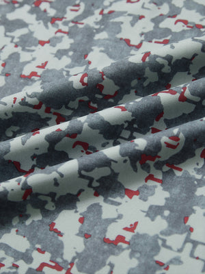Close-up of grey/wine camo full print lightweight quarter zip pullover fabric, soft and breathable texture