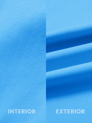 Close-up of inside and outside fabric of water-resistant fleece golf vest in sky blue, highlighting material texture and durability for optimal performance.
