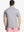 Rear half-body view showing fit and jacquard pattern of Ventilated Heather Jacquard Polo – FADED DENIM HEATHER