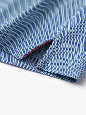 Close-up detail of side hem slit on AQUA Performance Ananas Jacquard Polo