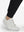 Detail view of hem on black flat front golf joggers pants with belt loops