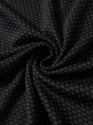 Jacquard quarter zip pullover, close-up fabric detail in dark grey/black showing textured knit pattern and soft feel