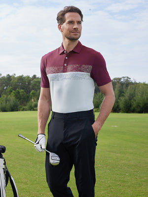 Model in glacier grey premium performance polo holding a golf club outdoors, half-body shot