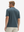 Side-back half-body view of model in dark grey moisture-wicking short sleeve henley shirt