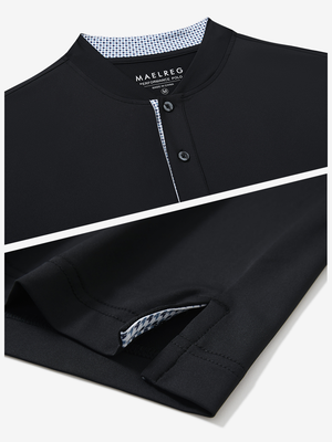 Detail of black moisture-wicking short sleeve henley shirt showing collar and hem vent construction.
